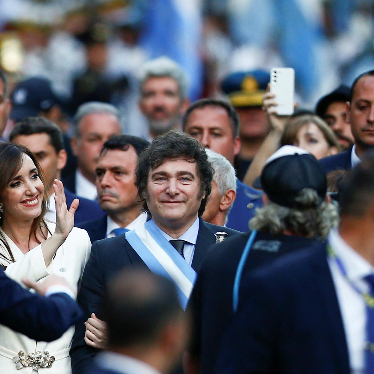 Argentina's President Javier Milei and Vice President Victoria Villarruel walk to the Metropolitan Cathedral.
