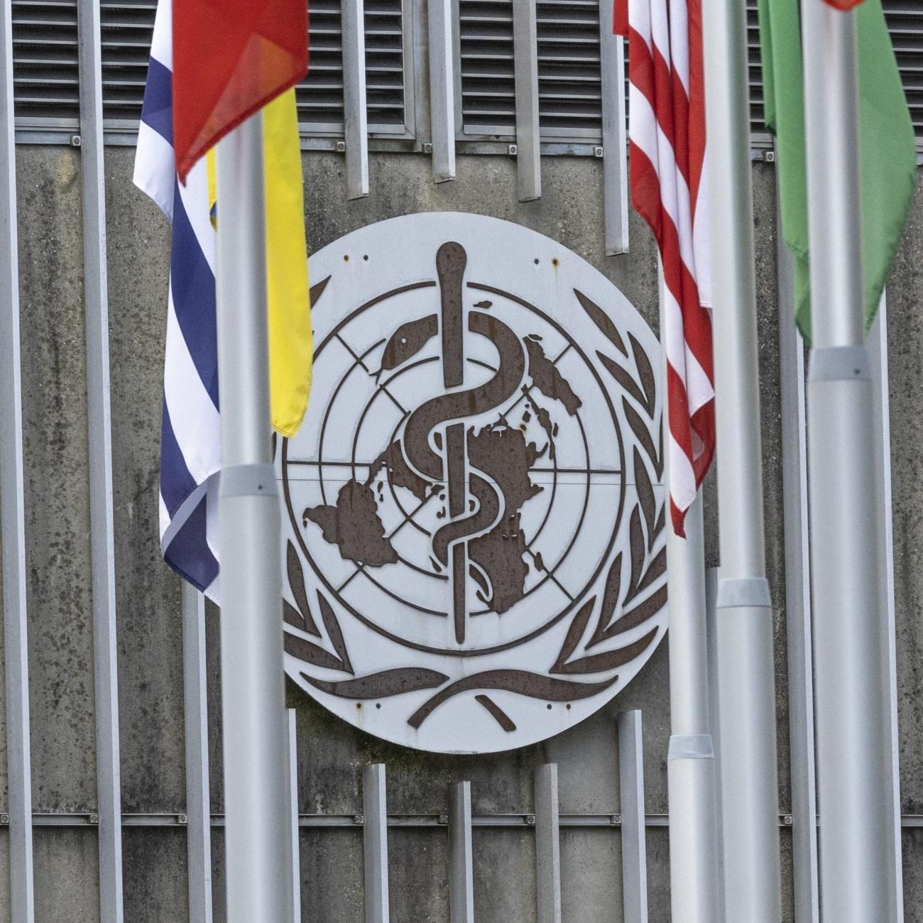 The World Health Organization (WHO) logo is seen near its headquarters.