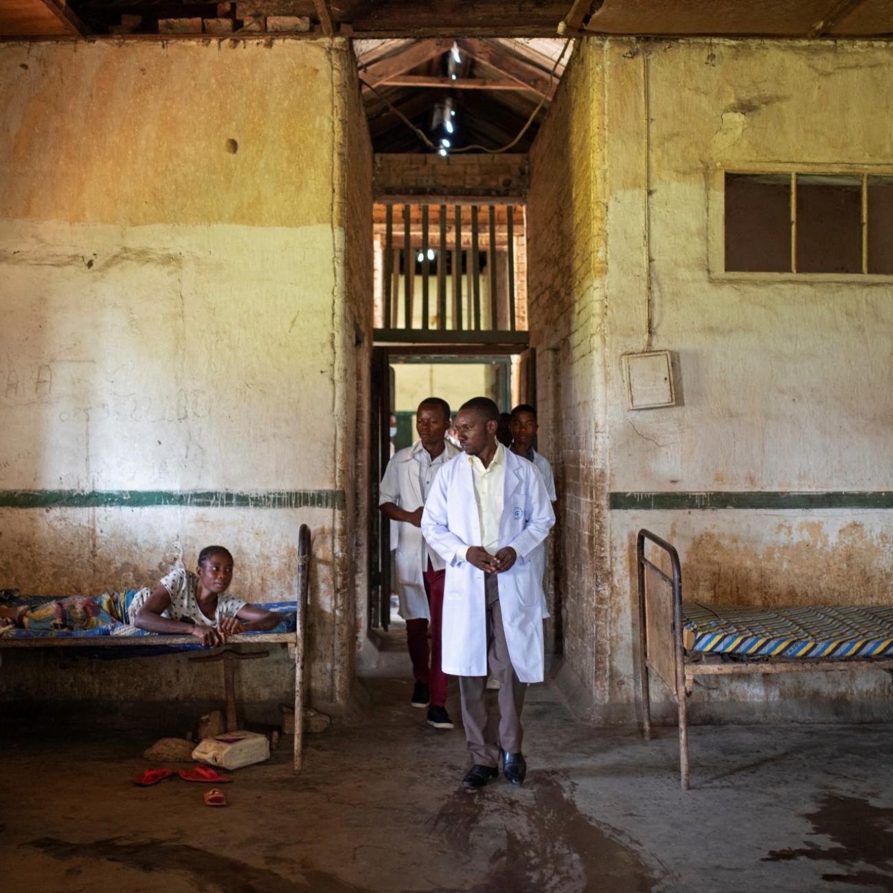 Dr. Fabien Kongolo does his morning rounds, followed by nurses and trainee doctors at the Yakusu General Hospital, in Tshopo, Democratic Republic of Congo, October 5, 2022. 