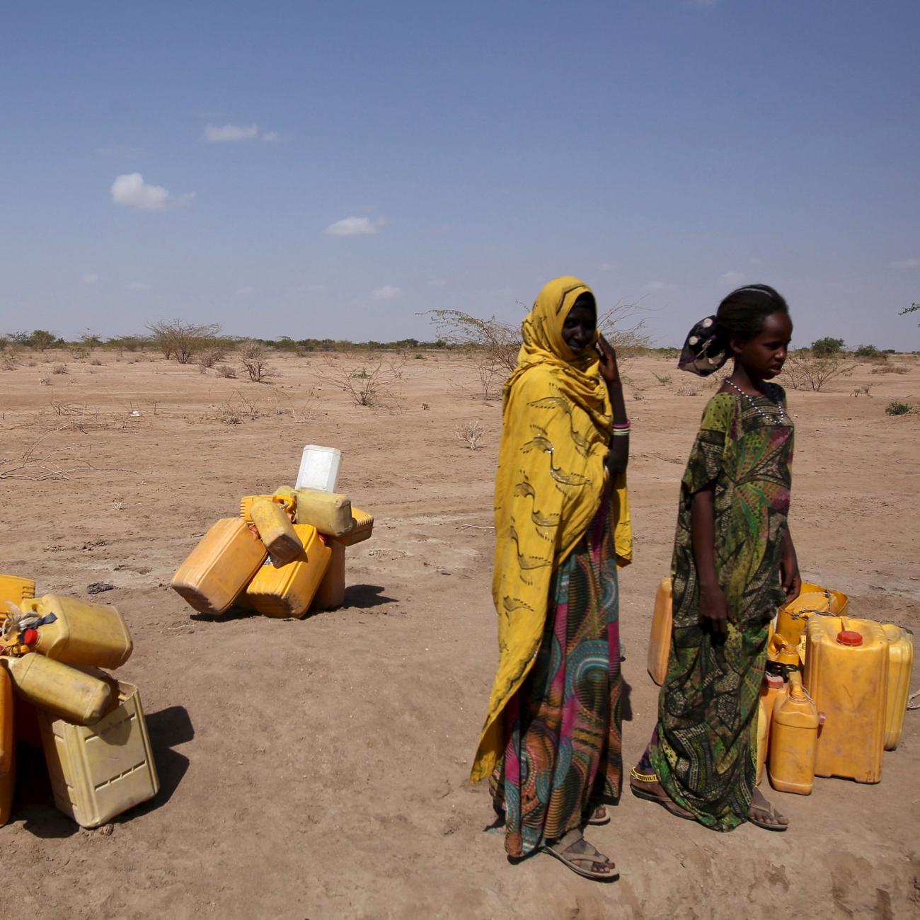 Women wait to collect water in the drought stricken Somali region.