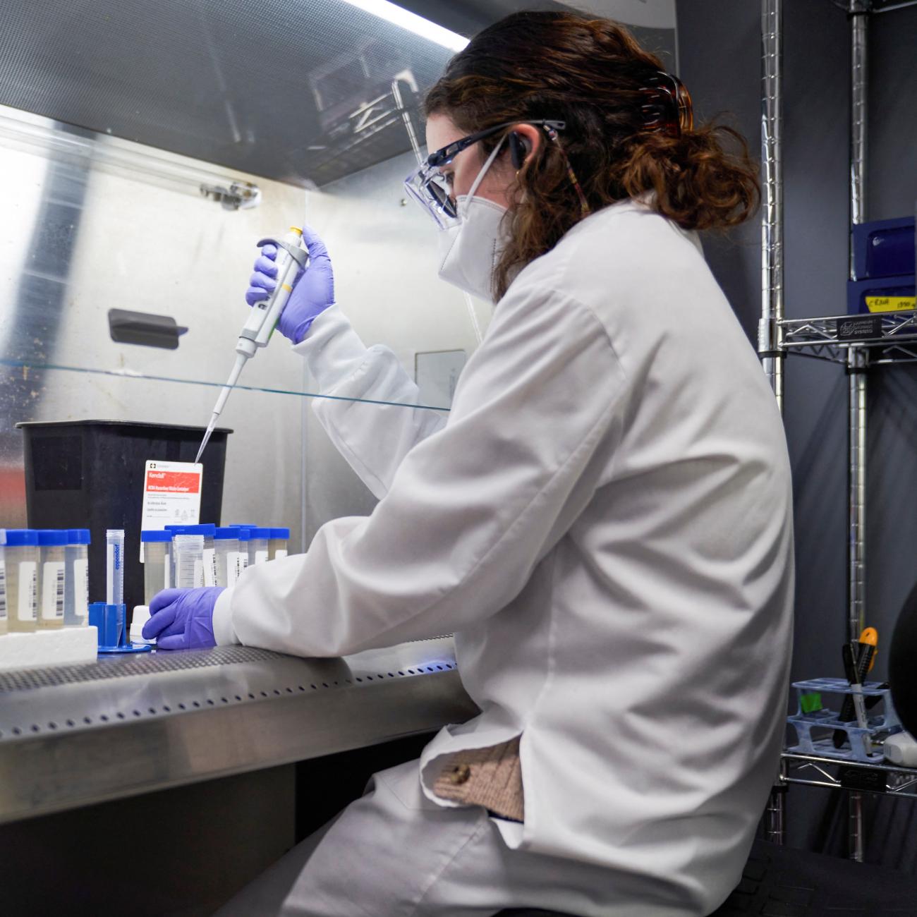 A lab technician tests wastewater samples from around the United States for the coronavirus disease (COVID-19) at the Biobot Analytics, in Cambridge, Massachusetts, February 22, 2022.