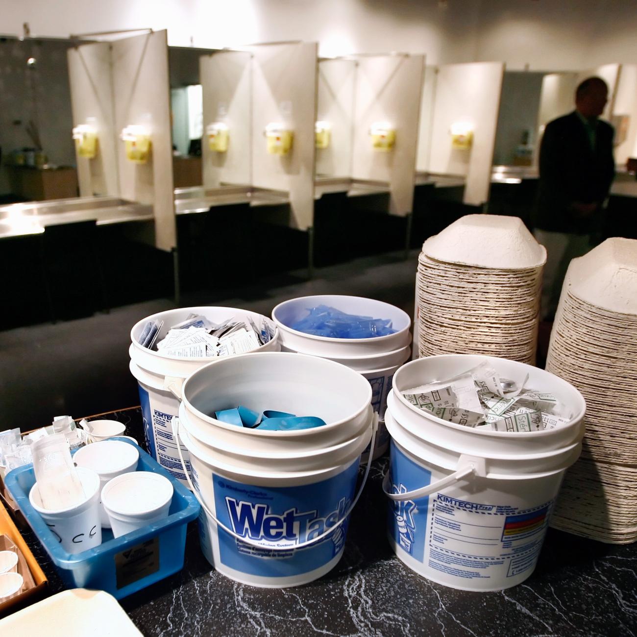 Supplies including syringes, bandaids and antiseptic pads waits to be used inside a safe injection site.