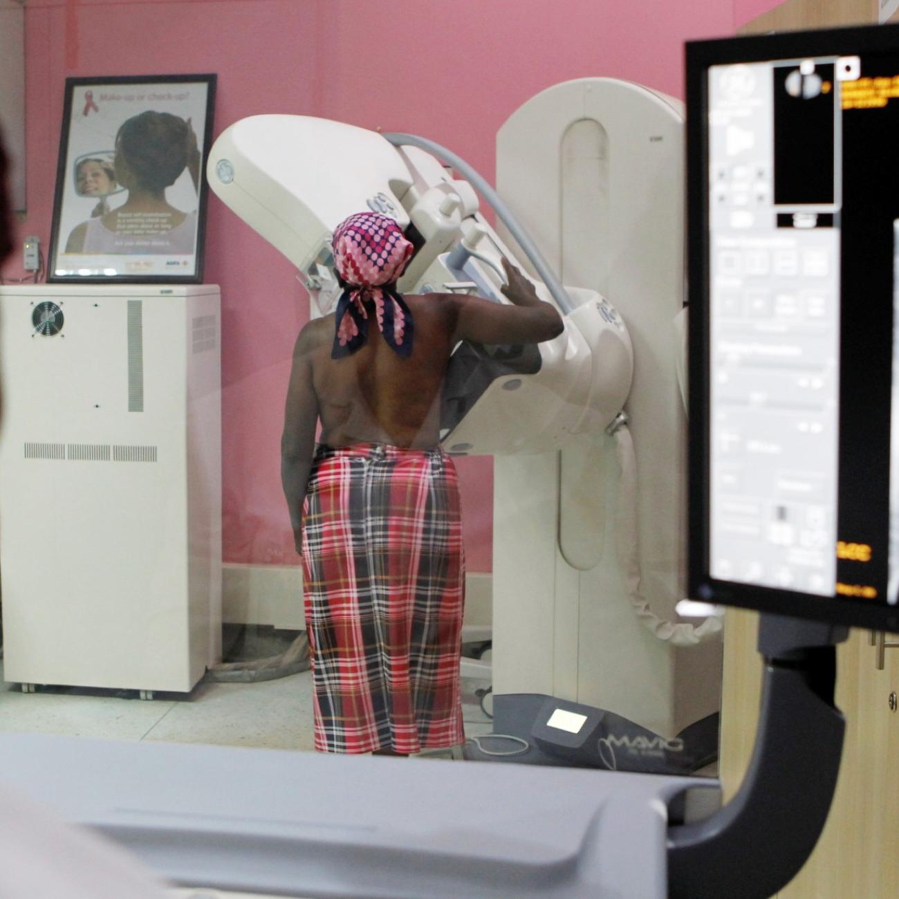 A patient undergoes a mammogram X-ray picture of the breast to look for early signs of breast cancer in the radiology unit at the Kenyatta National Hospital in Nairobi, Kenya on January 23, 2020. 