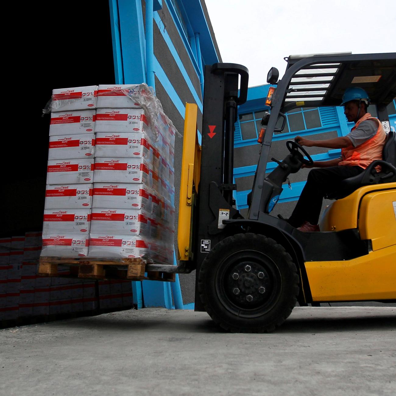 A worker transports therapeutic food in a United Nations International Children's Emergency Fund warehouse, in Addis Ababa, Ethiopia, on April 22, 2016.