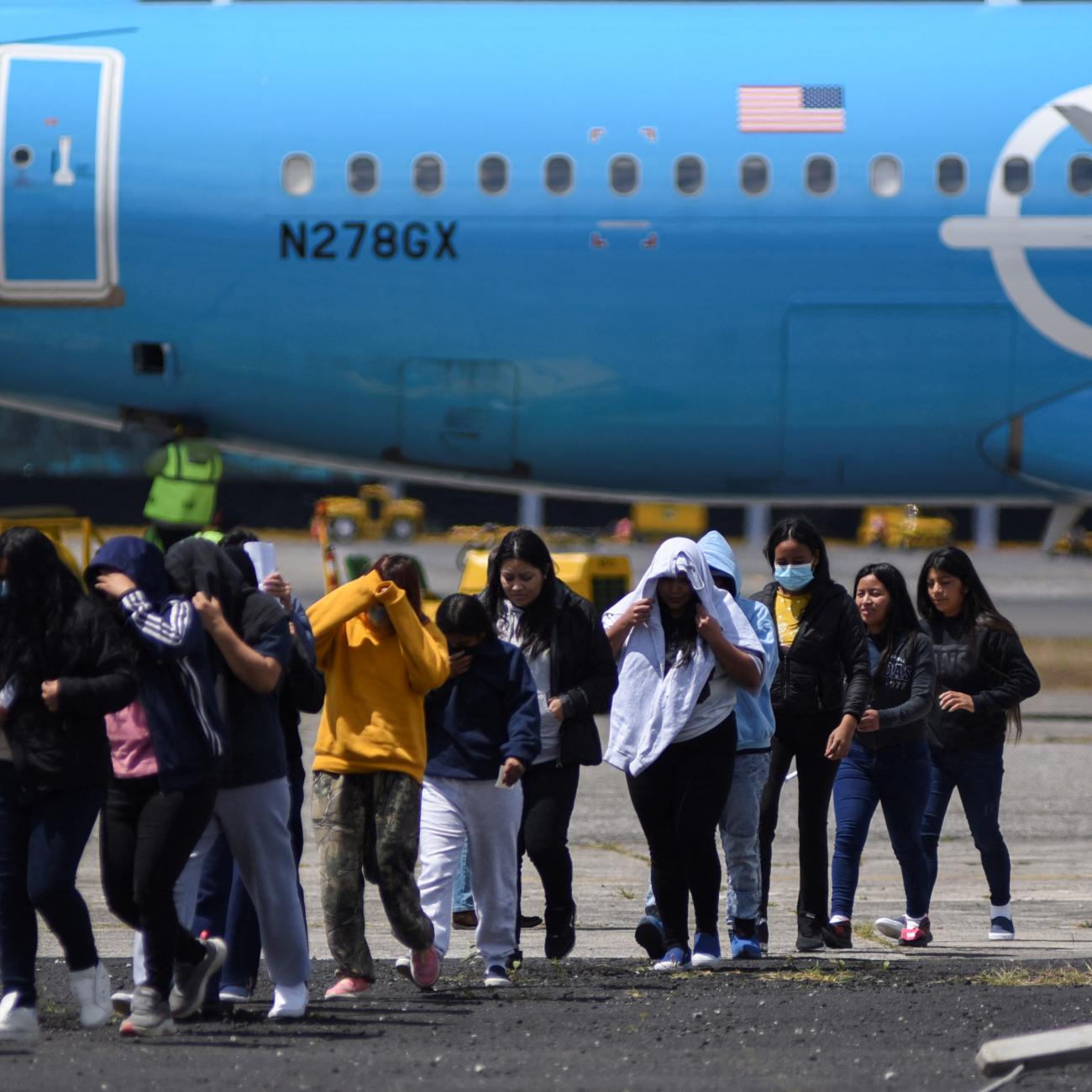 Guatemalan migrants arrive at La Aurora Air Base on a deportation flight from the United States, in Guatemala City, Guatemala, on February 18, 2025.