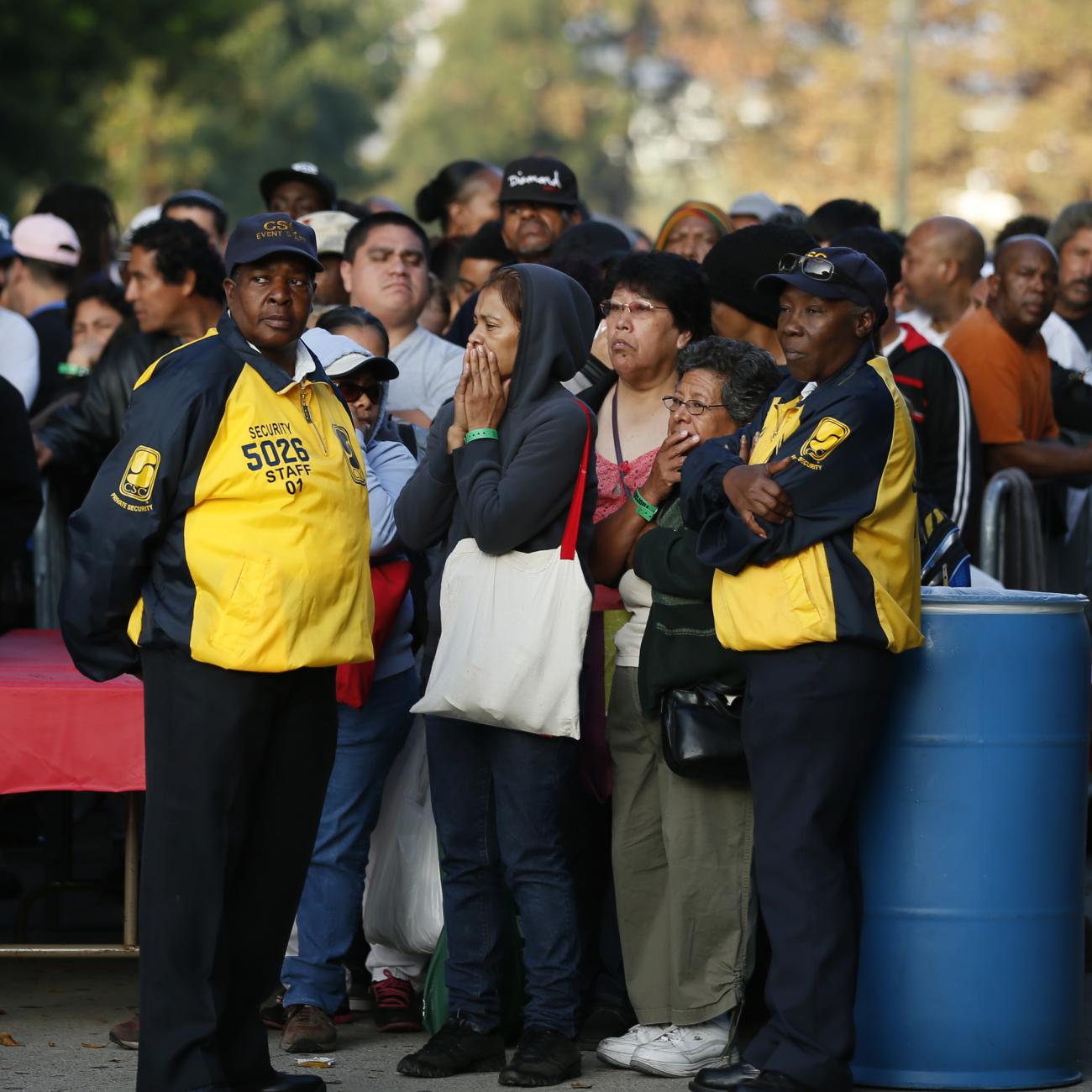 People wait in line at the Care Harbor/LA free clinic in Los Angeles, California, on September 27, 2012. 