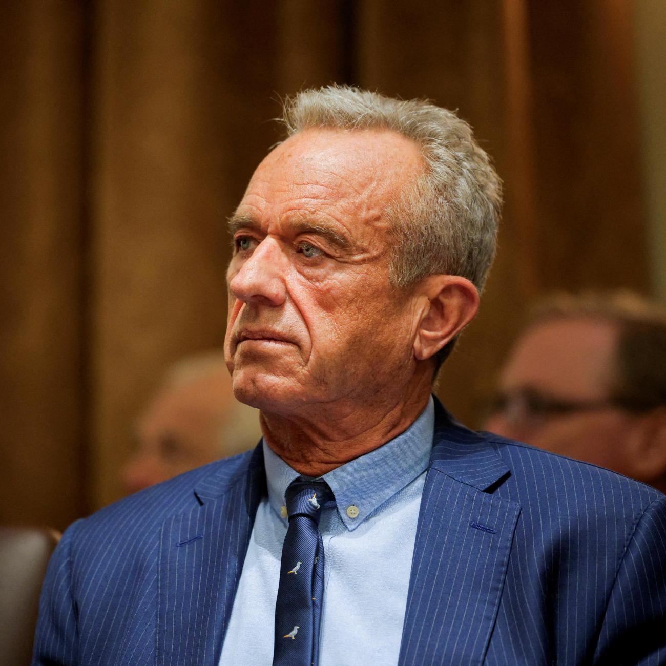 Secretary of Health and Human Services Robert F. Kennedy sits as U.S. President Donald Trump hosts his first cabinet meeting, in Washington, DC, on February 26, 2025. 
