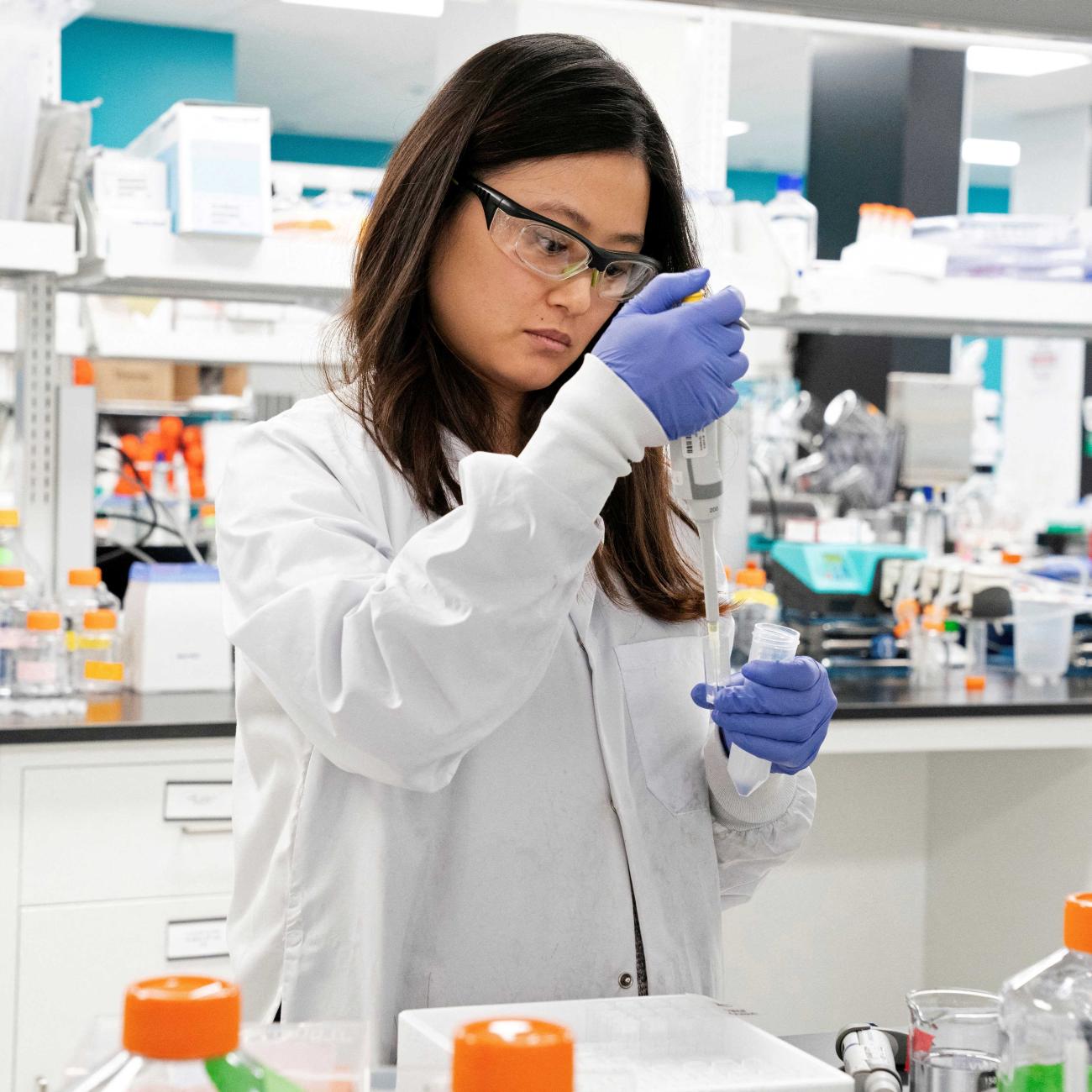 Research assistant Marion Hong, of RNA medicines company Arcturus Therapeutics, conducts research on a vaccine for COVID-19, in San Diego, California, on March 17, 2020. 