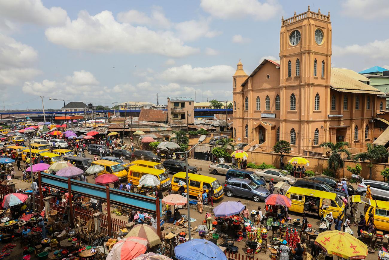 A general view of a food market after Nigeria's President Muhammadu Buhari called for a lockdown starting the same day to limit the spread of coronavirus in Lagos, Nigeria on March 30, 2020. The picture shows a market bustling with trade. REUTERS/Temilade Adelaja