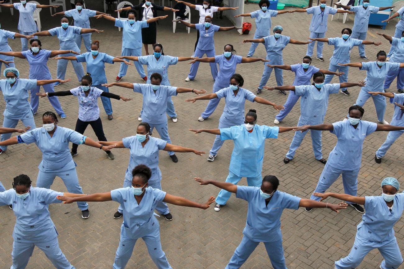 A call for funding community health alongside other types of health care—like the nurses who staff the national hospital in Nairobi, Kenya seen here during the coronavirus outbreak on May 28, 2020. The photo shows a field of nurses exercising in a field. REUTERS