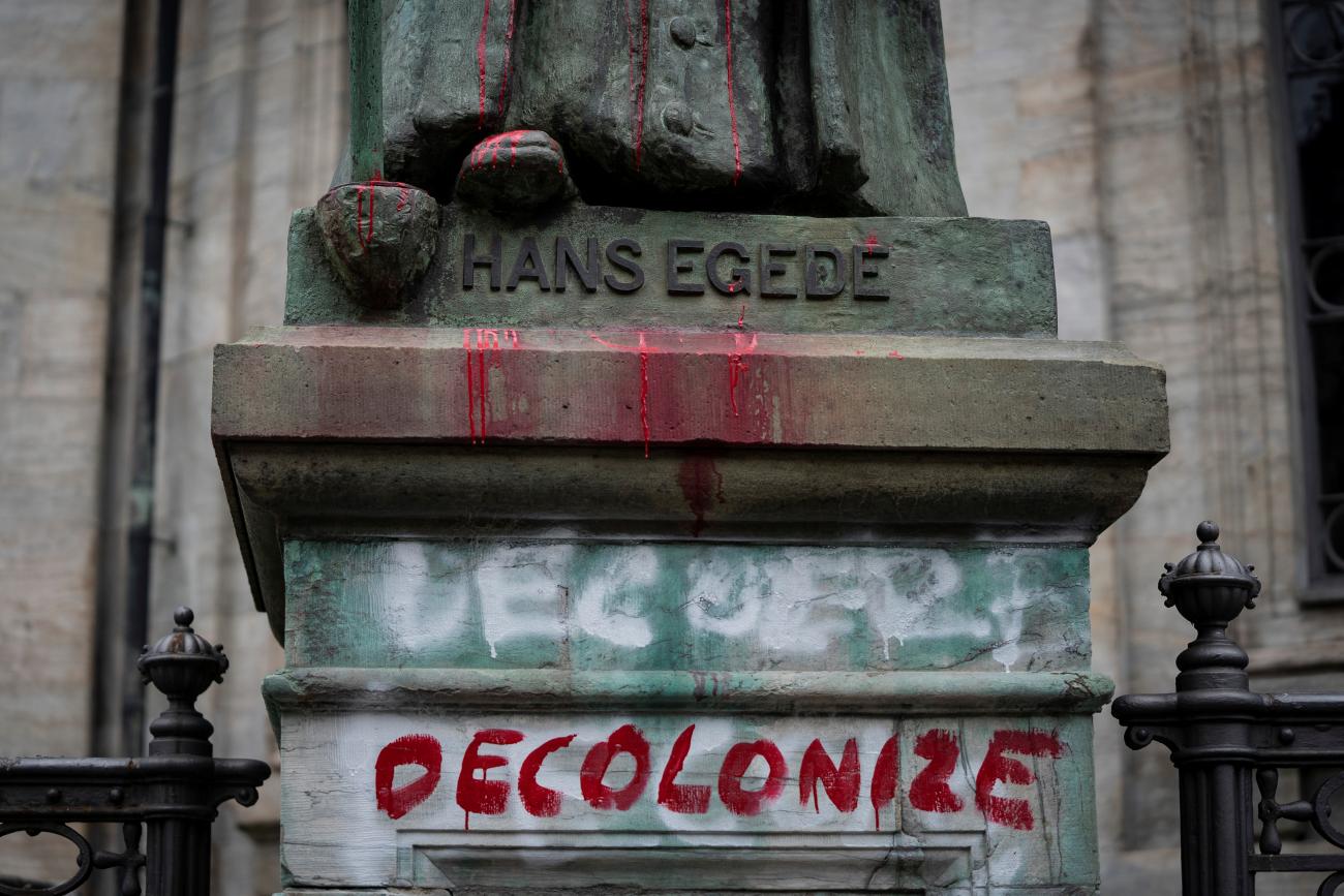 A vandalized statue of the Danish-Norwegian 18th century missionary Hans Egede is seen at the Marble Church (Frederik's Church), in Frederiksstaden, in Copenhagen, Denmark June 30, 2020. 