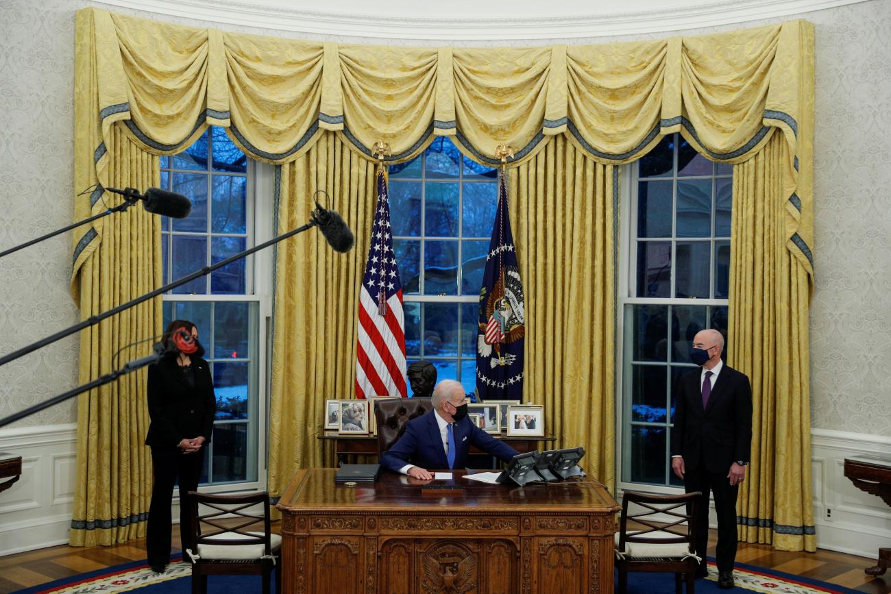 U.S. President Joe Biden looks on as he prepares to sign executive orders at the White House in Washington, U.S., February 2, 2021. 