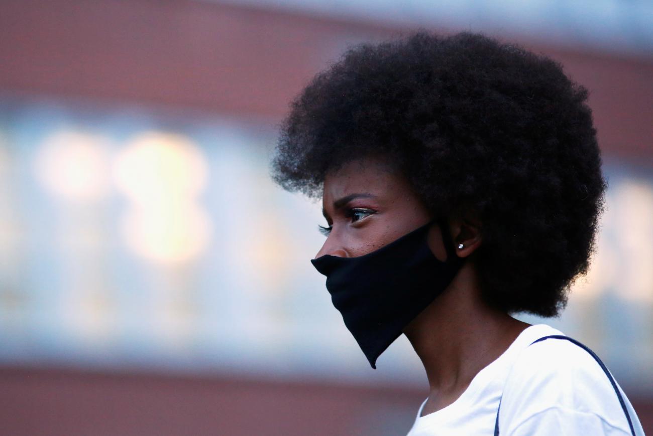 A woman wears a face mask due to the ongoing coronavirus disease in Denver, Colorado on August 24, 2020.