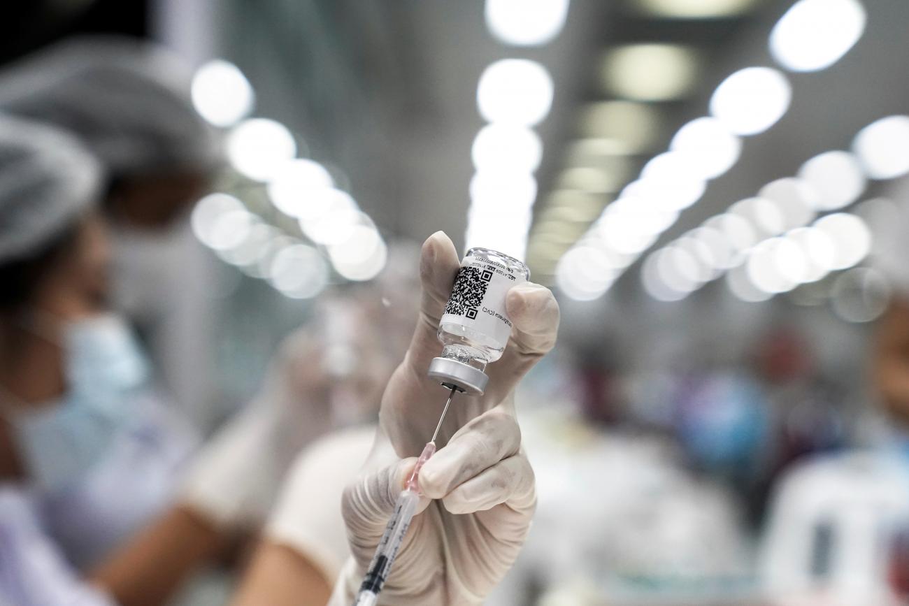 A health worker prepares a dose of AstraZeneca COVID-19 vaccine at the Central Vaccination Center inside the Bang Sue Grand Station (railway station), in Bangkok, Thailand, on June 21, 2021.