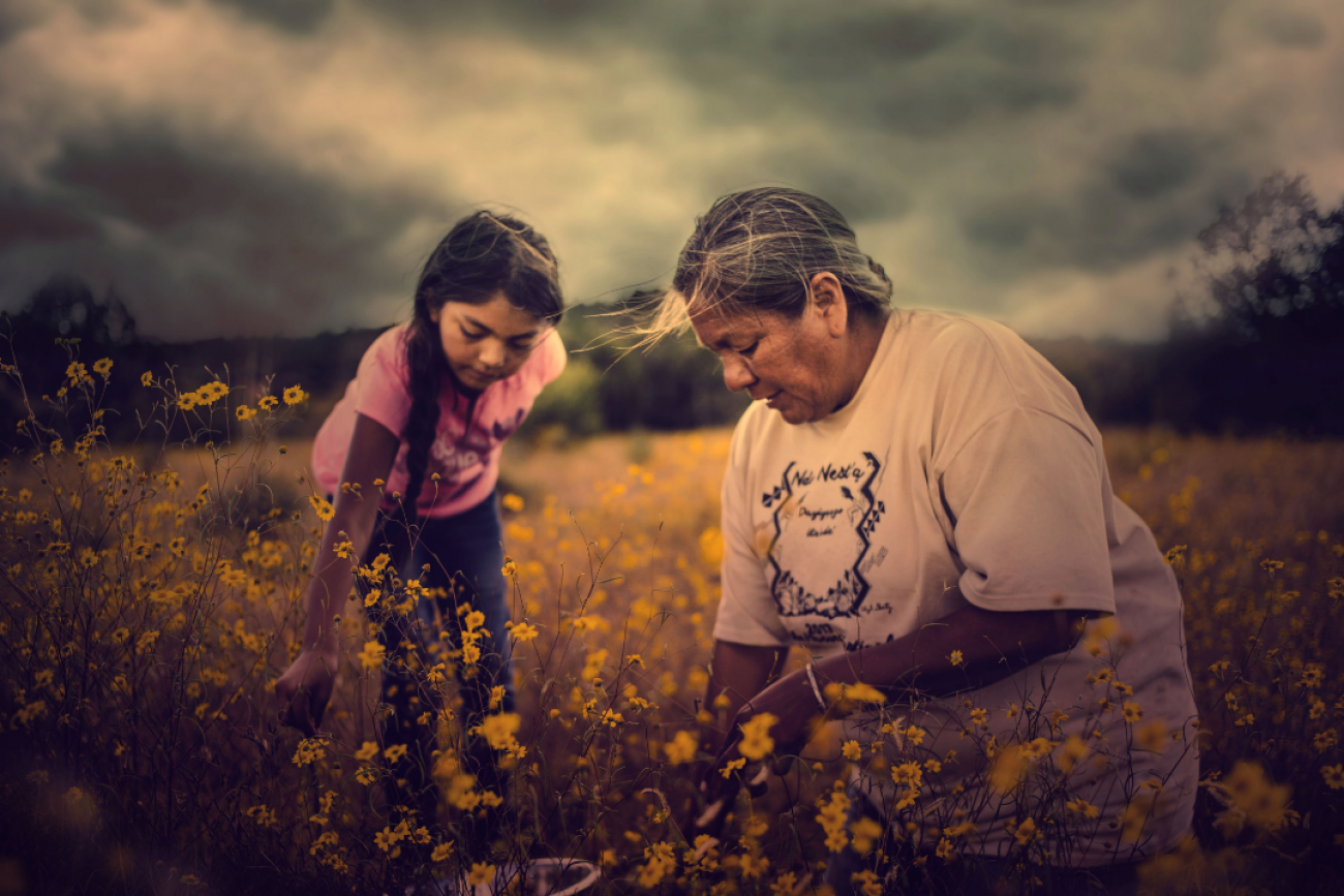 Twila Cassadore teaching her niece to forage for food on the San Carlos Apache Nation, Arizona.