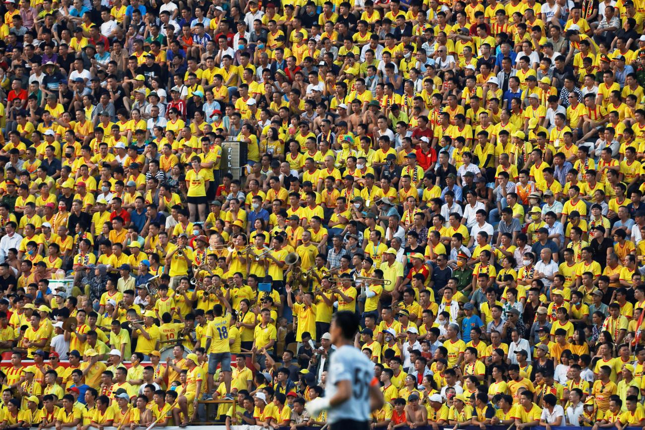 Soccer fans attend a match between Viettel and Duoc Nam Ha Nam Dinh of Vietnam's national soccer league after an outbreak and nationwide COVID-19 lockdown, in Nam Dinh province, Vietnam, on June 5, 2020.