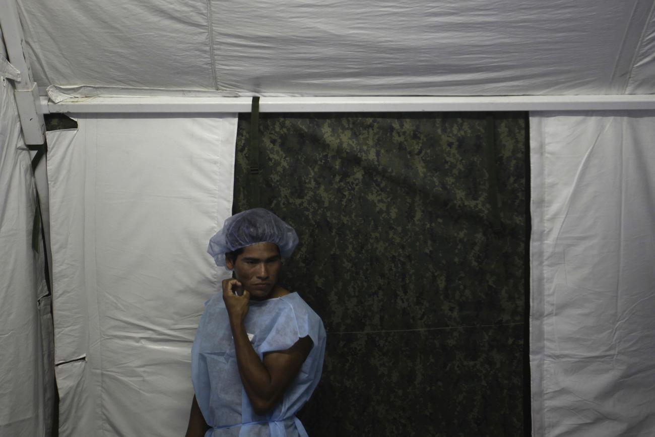 A man from the Yanomamy tribe waits for his surgery at the surgical center at the Cartucho community during a medical expedition in Santa Izabel do Rio Negro, in Amazonas state in northern Brazil, November 8, 2010. 