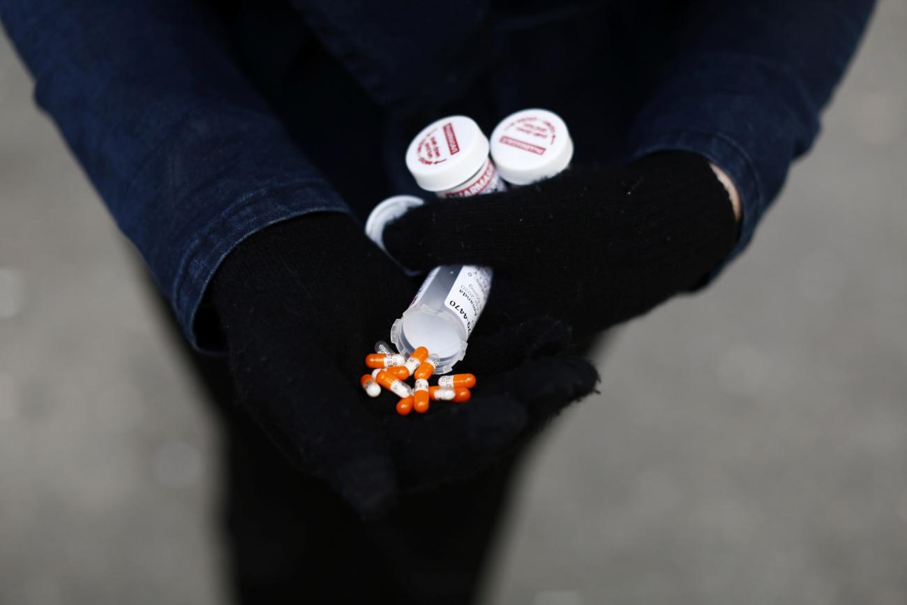 A fentanyl user displays a "safe supply" of opioid alternatives in Vancouver, Canada