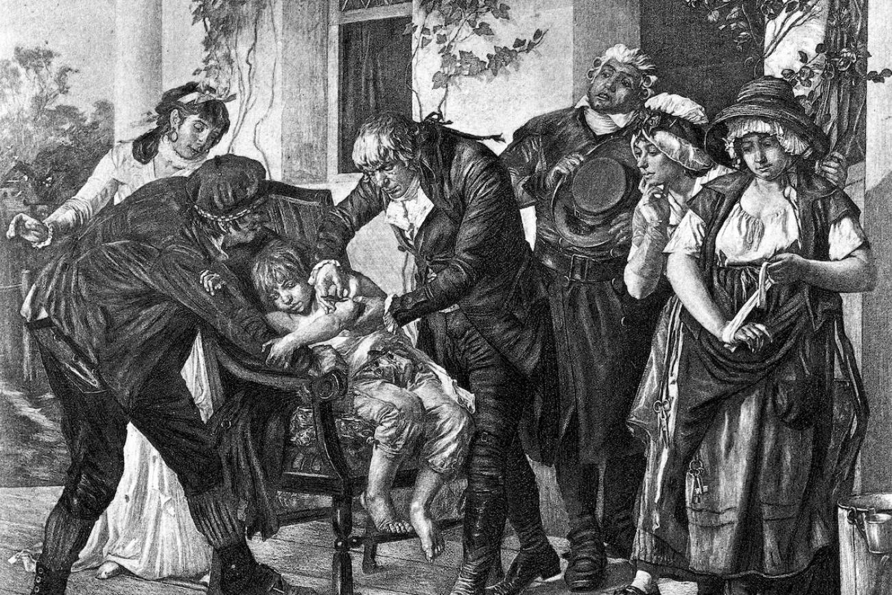 An illustration from 1894 shows Dr. Edward Jenner administering the world's first smallpox vaccine.