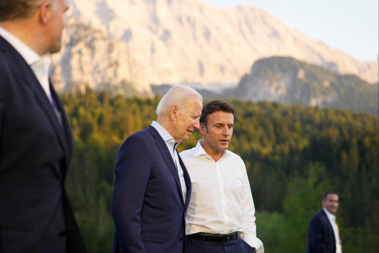 DOCUMENT DATE:  June 26, 2022  French President Emmanuel Macron, center right, speaks with U.S. President Joe Biden after a group photo at the G7 summit at Castle Elmau in Krue