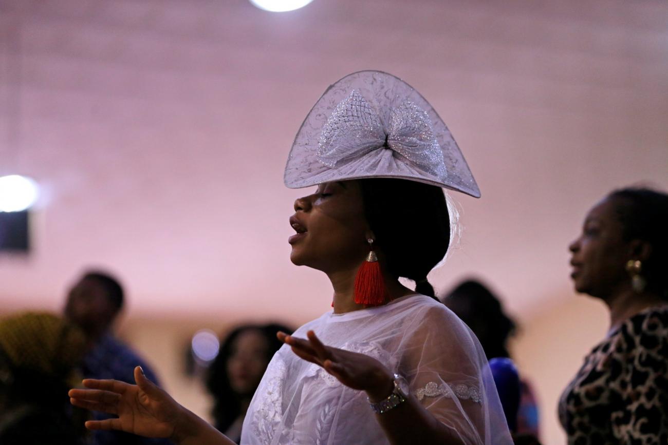 A woman attends a church service at Living Faith Church, following the outbreak of the coronavirus disease (COVID-19), in Abuja, Nigeria March 22, 2020