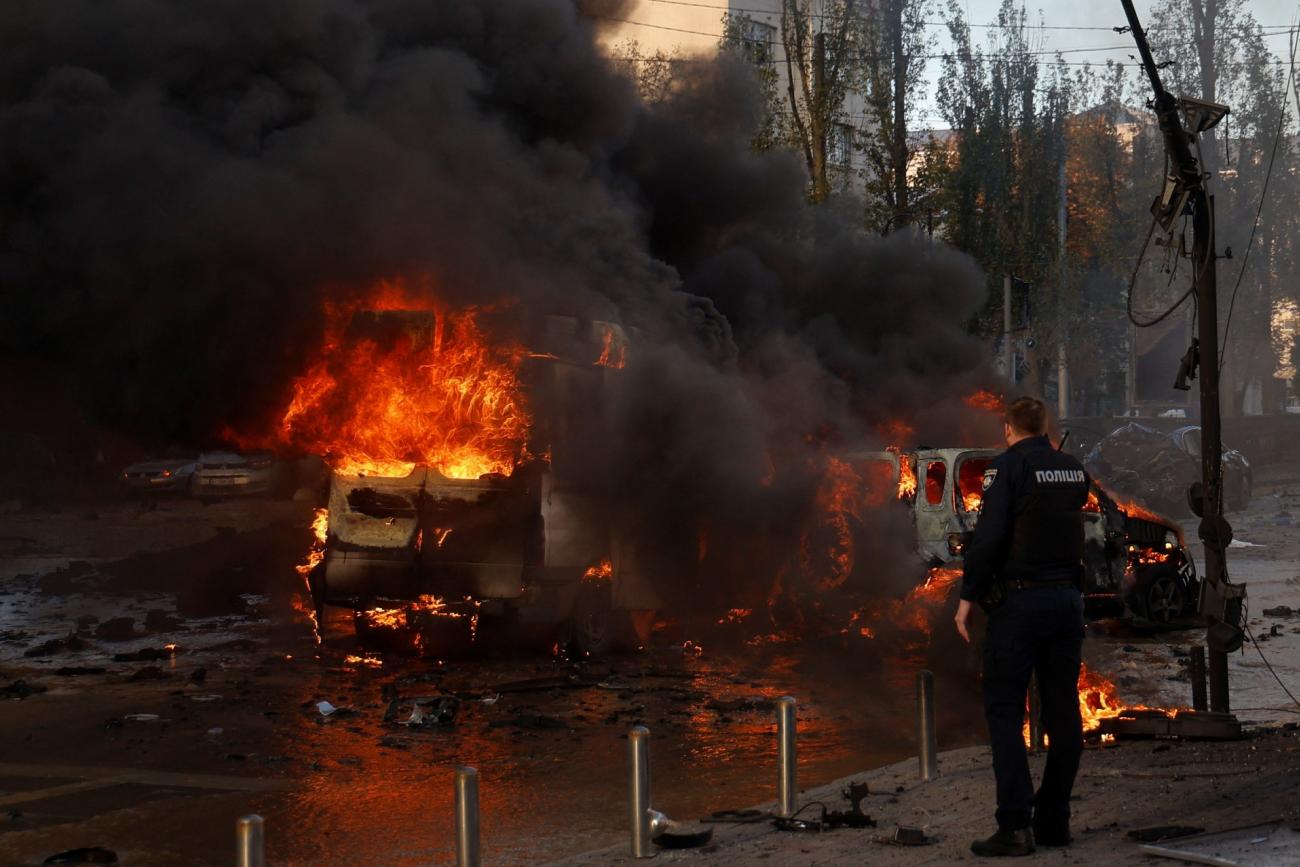 Cars are on fire after Russia's missile attack in Kyiv, Ukraine, on October 10, 2022.