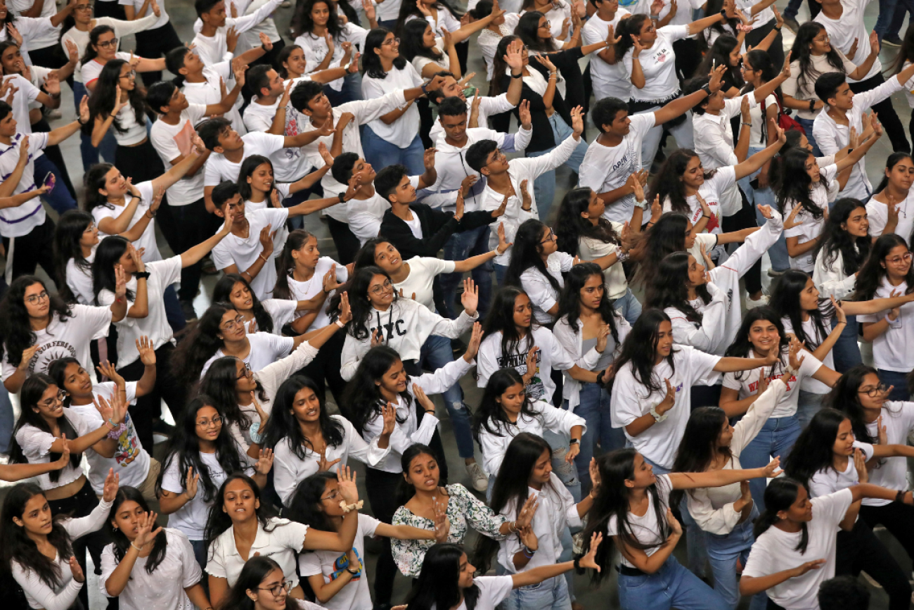 A bird's eye view of dozens of college students performing during a flash mob as a tribute to the cultural diversity of India, at Mumbai Central railway station, in Mumbai, India, September 22, 2022. REUTERS/Niharika Kulkarni