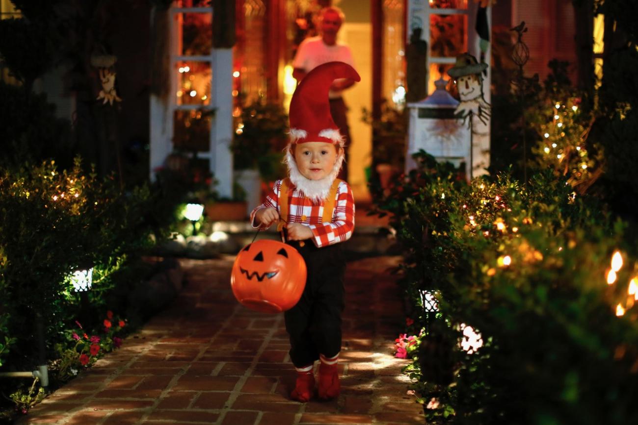 A boy collects candy as he goes trick-or-treating for Halloween in Santa Monica, California, October 31, 2012. (REUTERS/Lucy Nicholson)