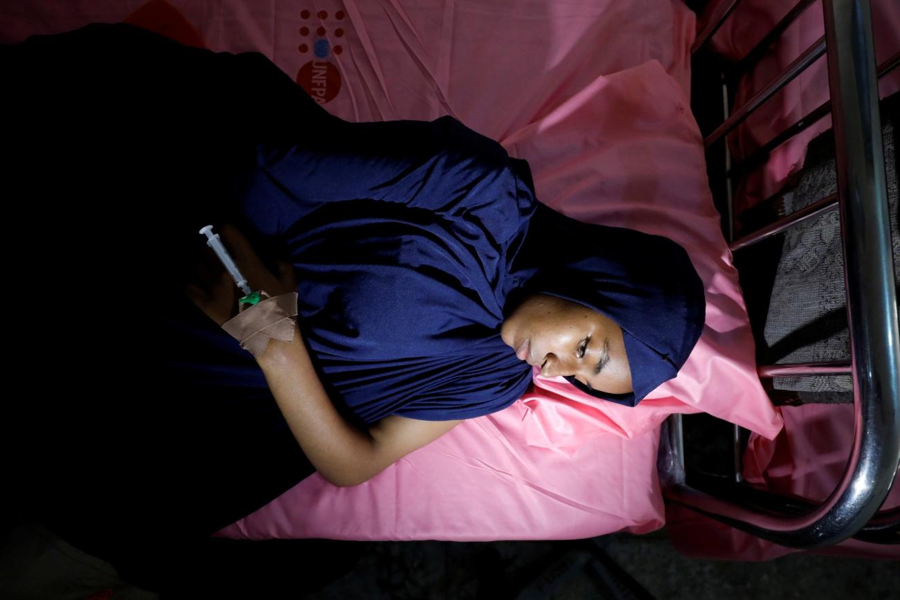 Ruqqayah Abubakar lies on a bed after being treated at an obstetric fistula repair centre in Maiduguri, Nigeria August 1, 2018.