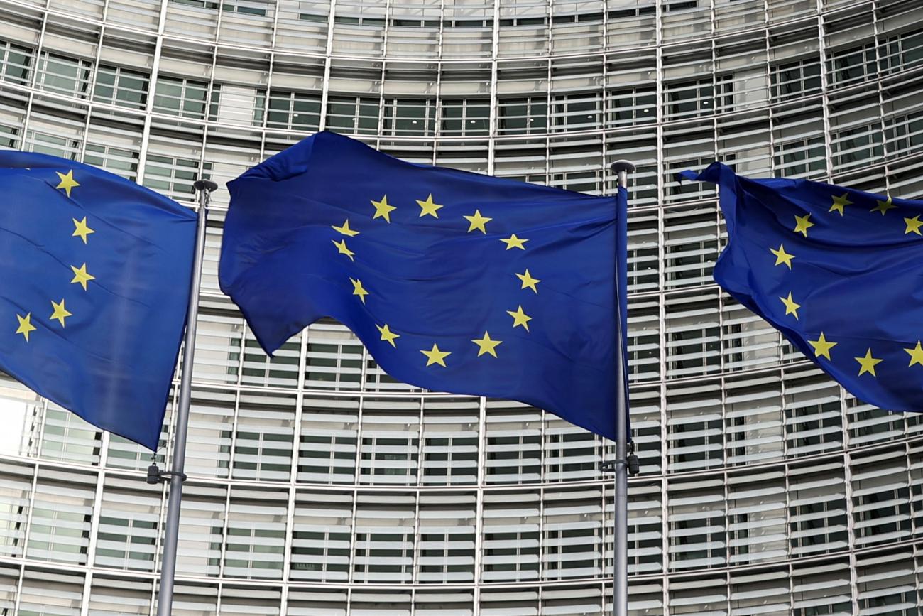 European Union flags fly outside the European Commission in Brussels.