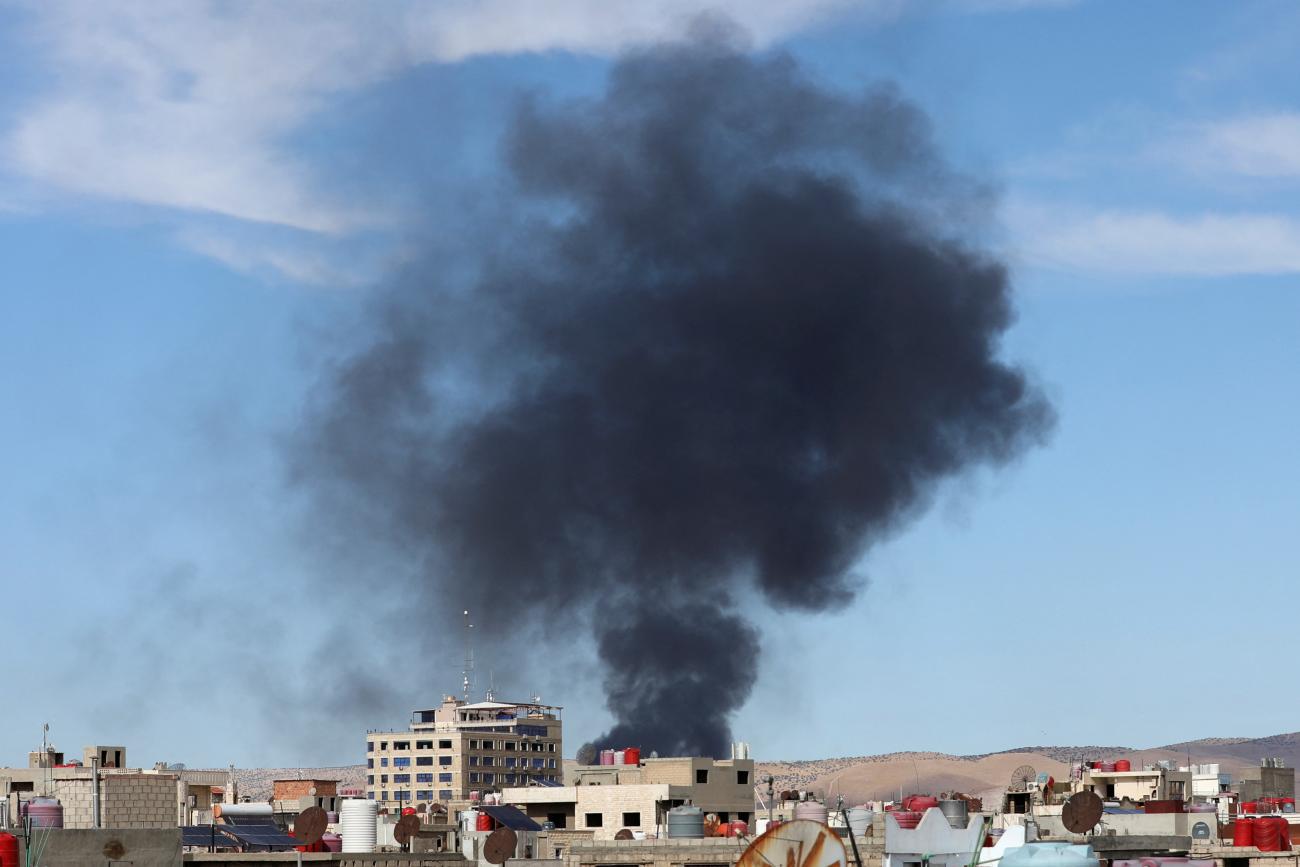 Smoke rises from Syria's Kurdish-controlled northeast city of Qamishli.