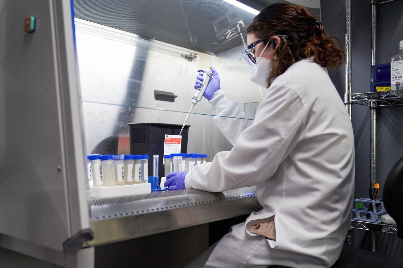 A lab technician tests wastewater samples from around the United States for the coronavirus disease (COVID-19) at the Biobot Analytics, in Cambridge, Massachusetts, February 22, 2022.