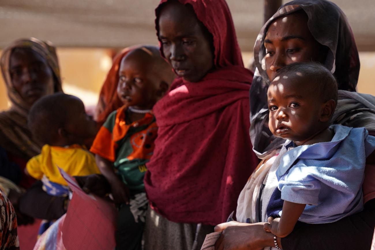 Women and babies are seen at the Zamzam displacement camp.