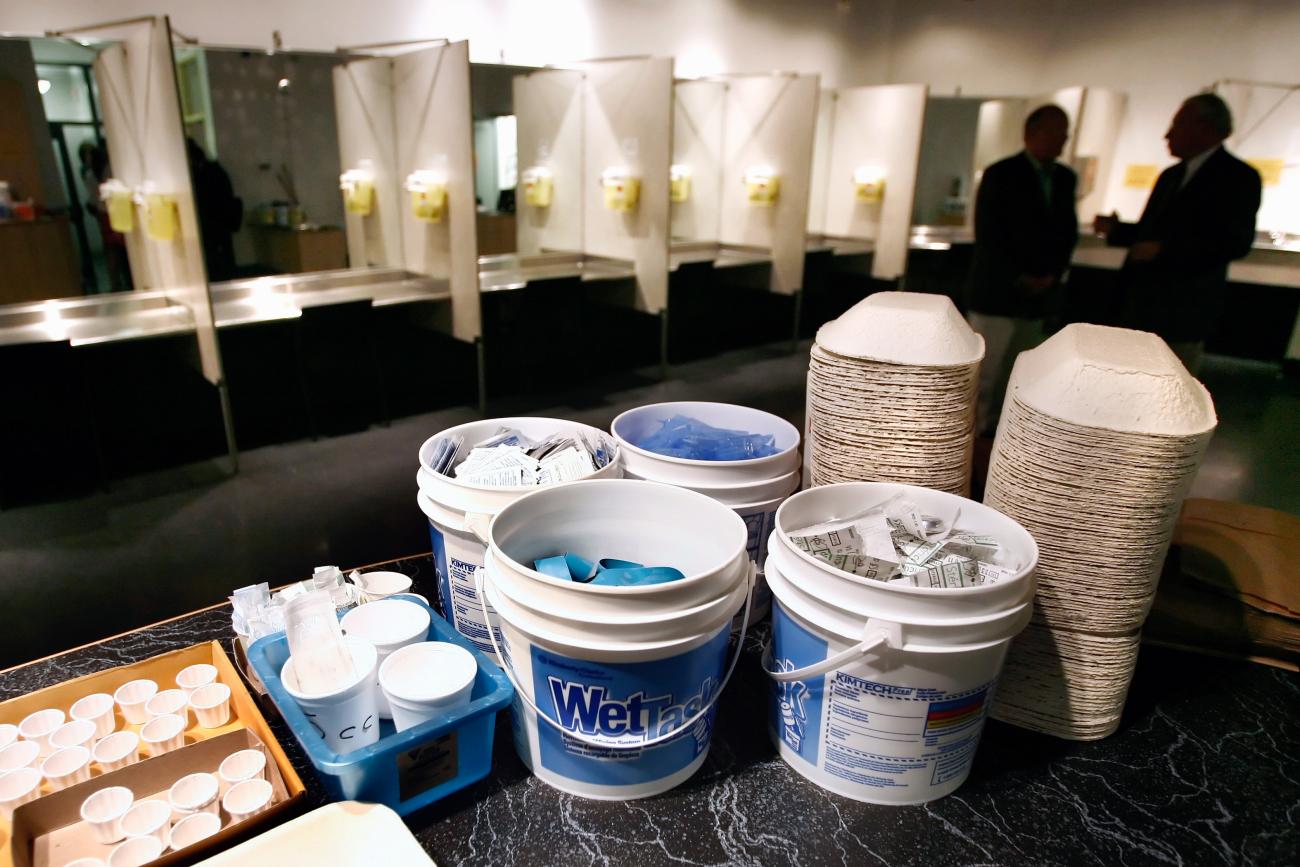 Supplies including syringes, bandaids and antiseptic pads waits to be used inside a safe injection site.