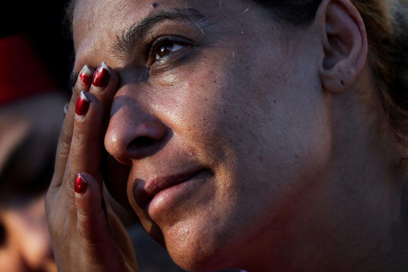 Amira, reacts during an interview at Beirut's central Martyrs' Square where many families fled from the Israeli strikes in southern Beirut.