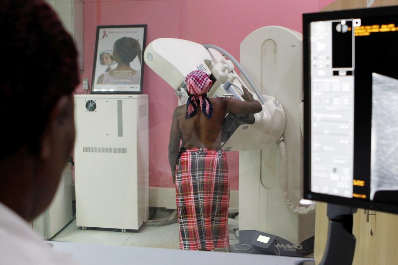A patient undergoes a mammogram X-ray picture of the breast to look for early signs of breast cancer in the radiology unit at the Kenyatta National Hospital in Nairobi, Kenya on January 23, 2020. 