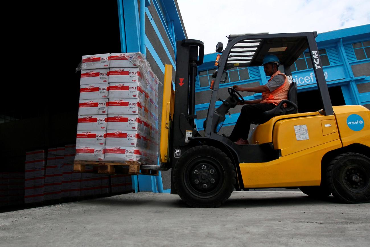 A worker transports therapeutic food in a United Nations International Children's Emergency Fund warehouse, in Addis Ababa, Ethiopia, on April 22, 2016.