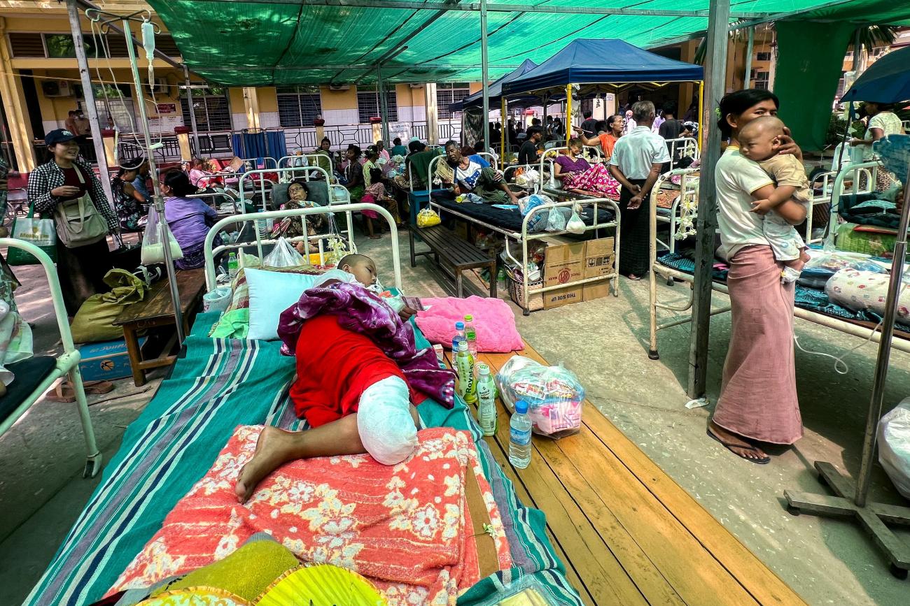Patients lie on beds inside the compound of Sagaing Hospital following a strong earthquake near its epicenter, in Sagaing, Myanmar, April 2, 2025. 
