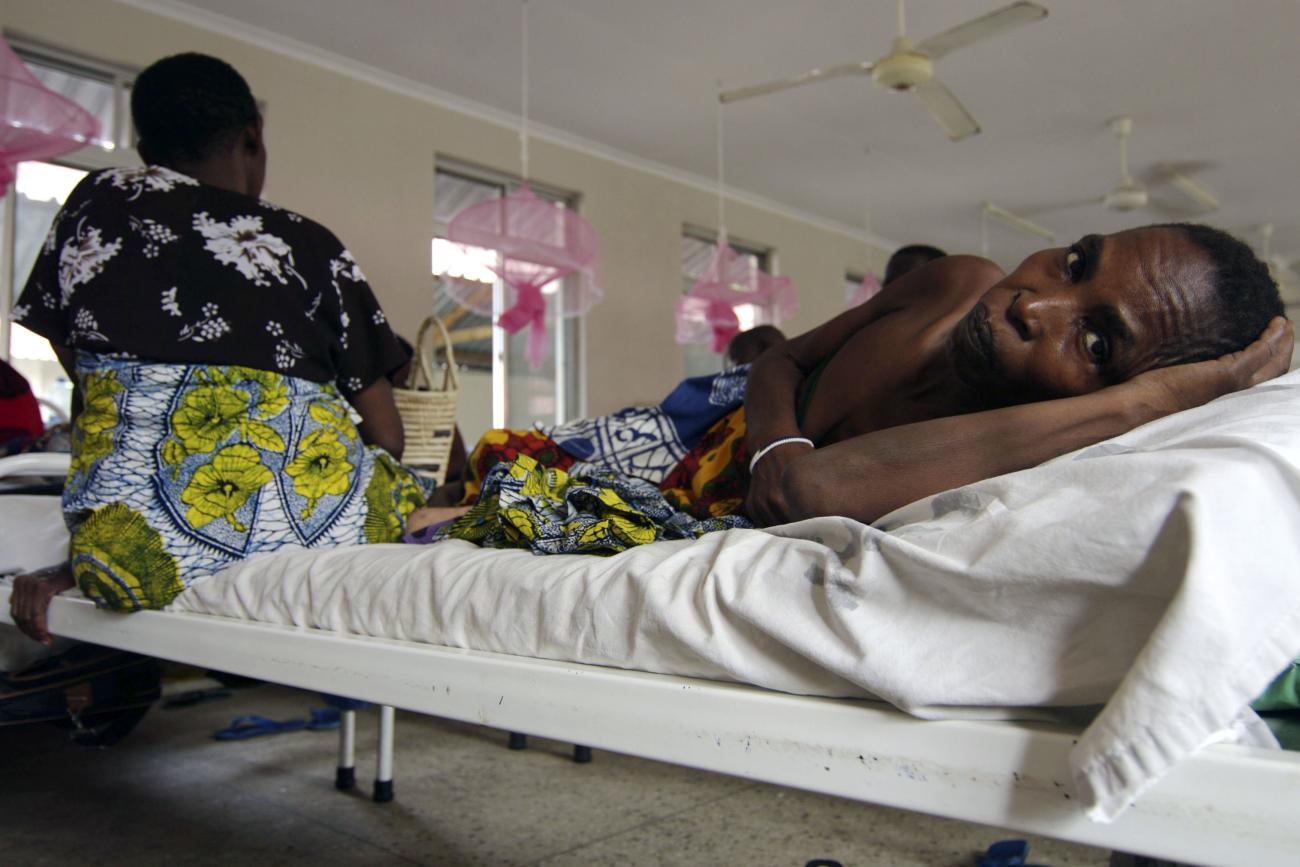 Cervical cancer patient lays on a bed in the female ward of a cancer institute, in Dar es Salaam, Tanzania, on November 11, 2009. 