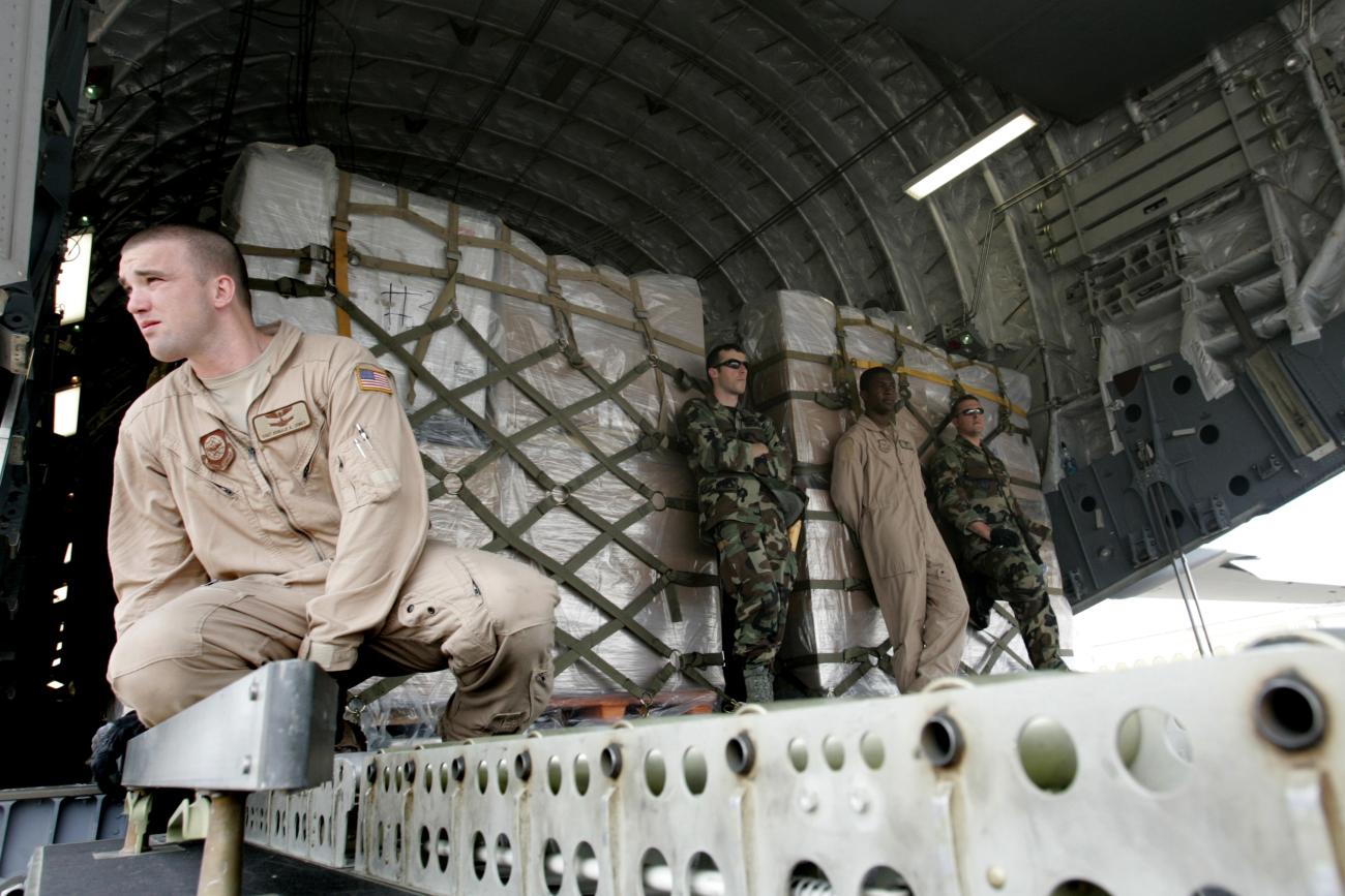 U.S. Air Force servicemen unload humanitarian aid from a U.S. military cargo plane at Tbilisi airport, in Tbilisi, Georgia, on August 14, 2008.