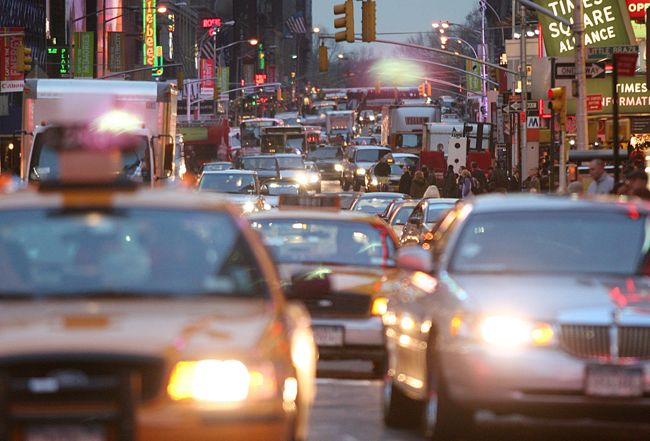 Cars squeeze into any space as they try to get though Time Square in new York City.