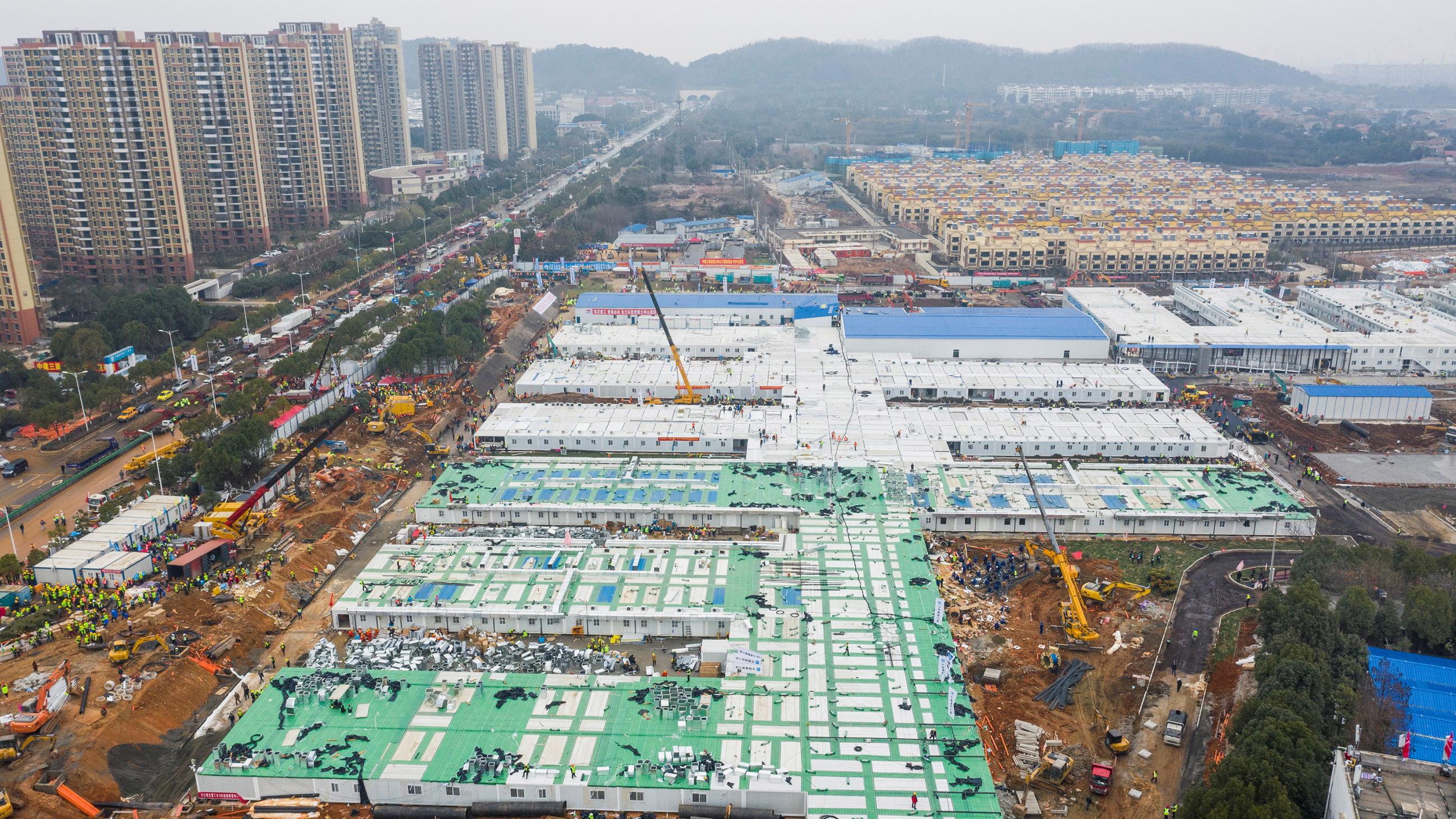  The photo shows an aerial view of a sprawling low-rise complex. 