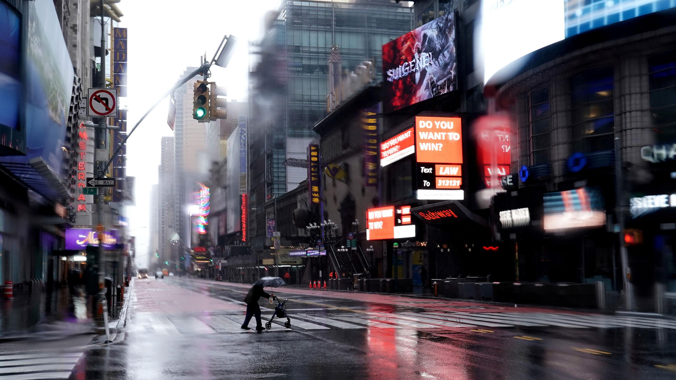 This is a striking photo of Times Square—New York in the Rain—as it's rarely been seen before: completely empty of cars and people. 
