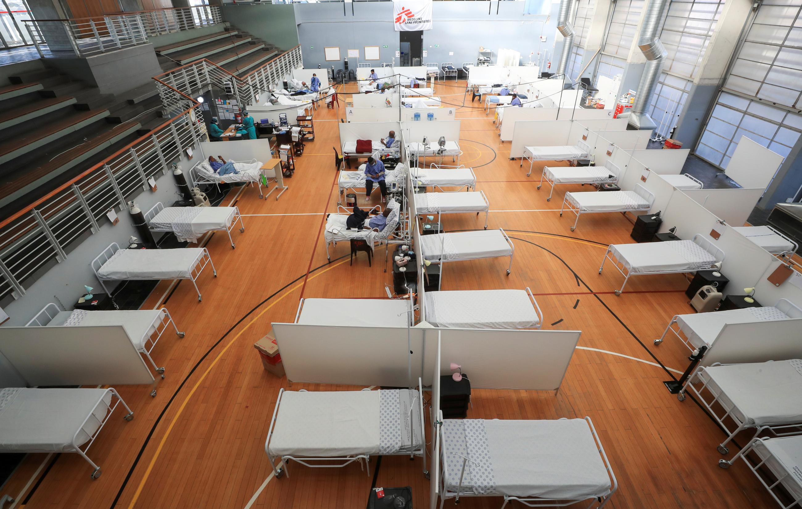Beds are seen at a temporary field hospital set up in a sports complex by Medecins Sans Frontieres (MSF) during the coronavirus disease (COVID-19) outbreak in Khayelitsha township near Cape Town, South Africa, July 21, 2020