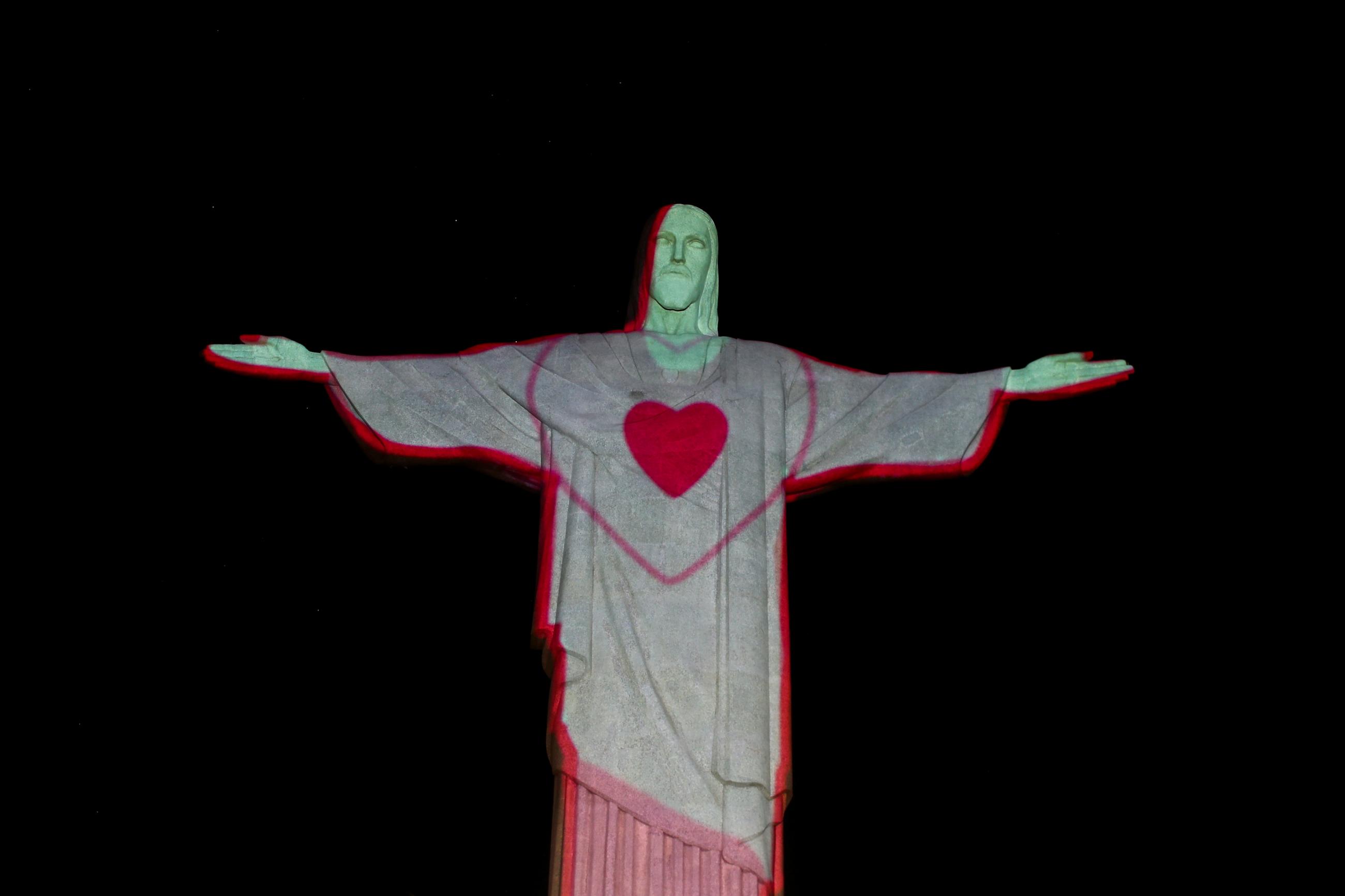 A form of a heart is reflected on Christ the Redeemer to raise awareness on the spread of the coronavirus disease (COVID-19) in Rio de Janeiro, Brazil on May 10, 2020.