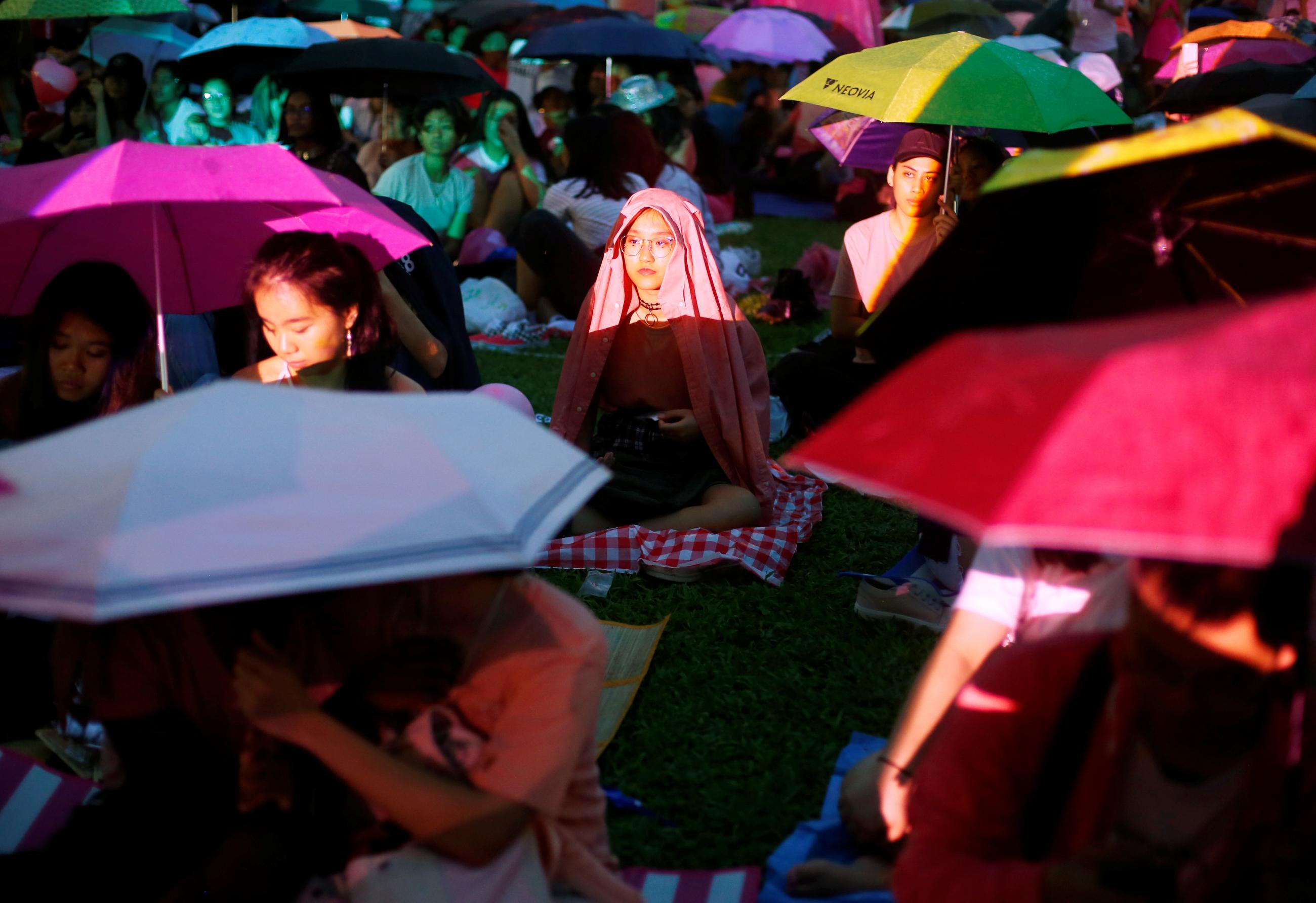 A participant of Pink Dot, an annual event organized in support of the LGBTQ+ community, is seen at the Speakers' Corner in Hong Lim Park in Singapore on June 29, 2019. 