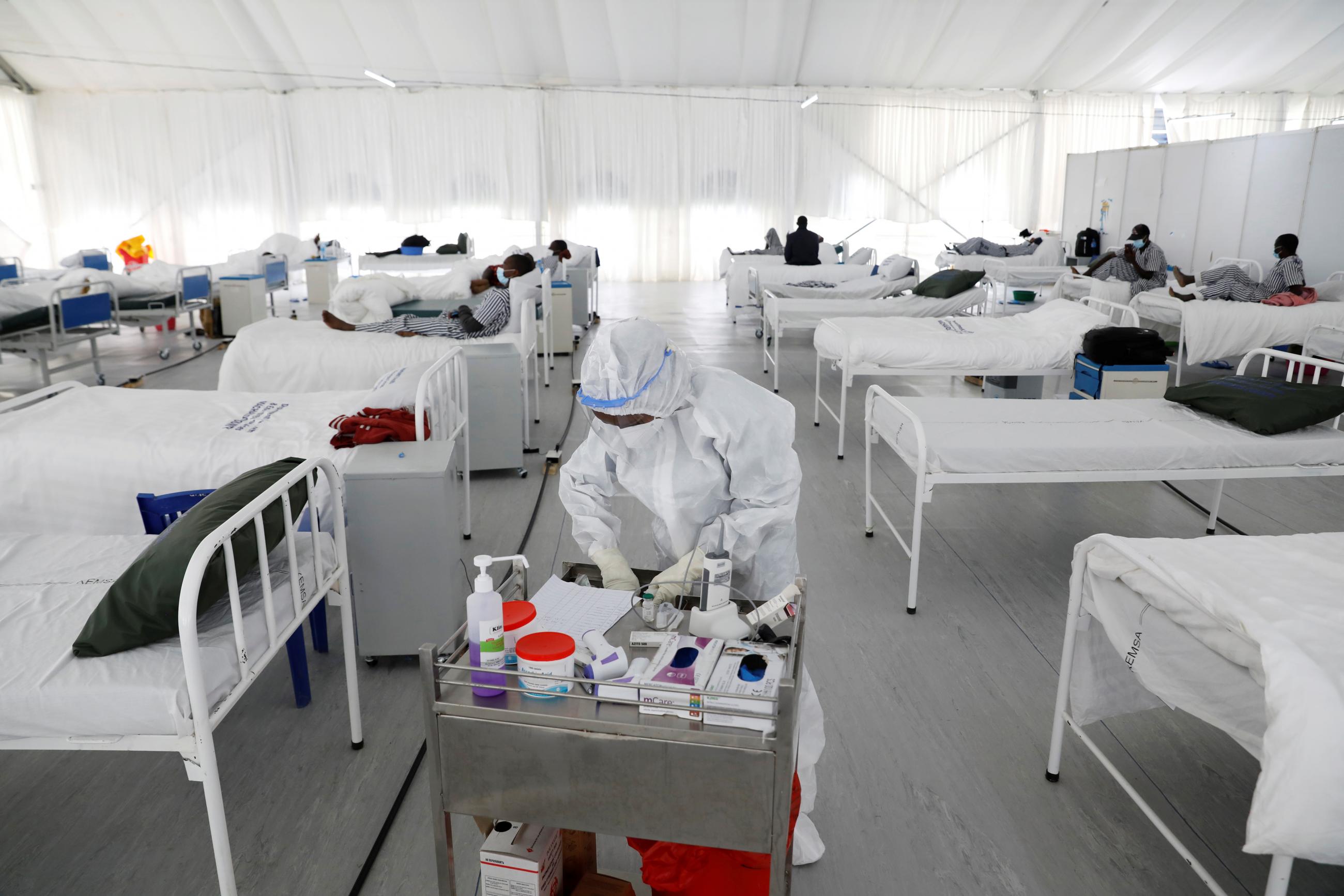 A nurse works inside a field hospital built on a soccer stadium in Machakos, Kenya on July 23, 2020.