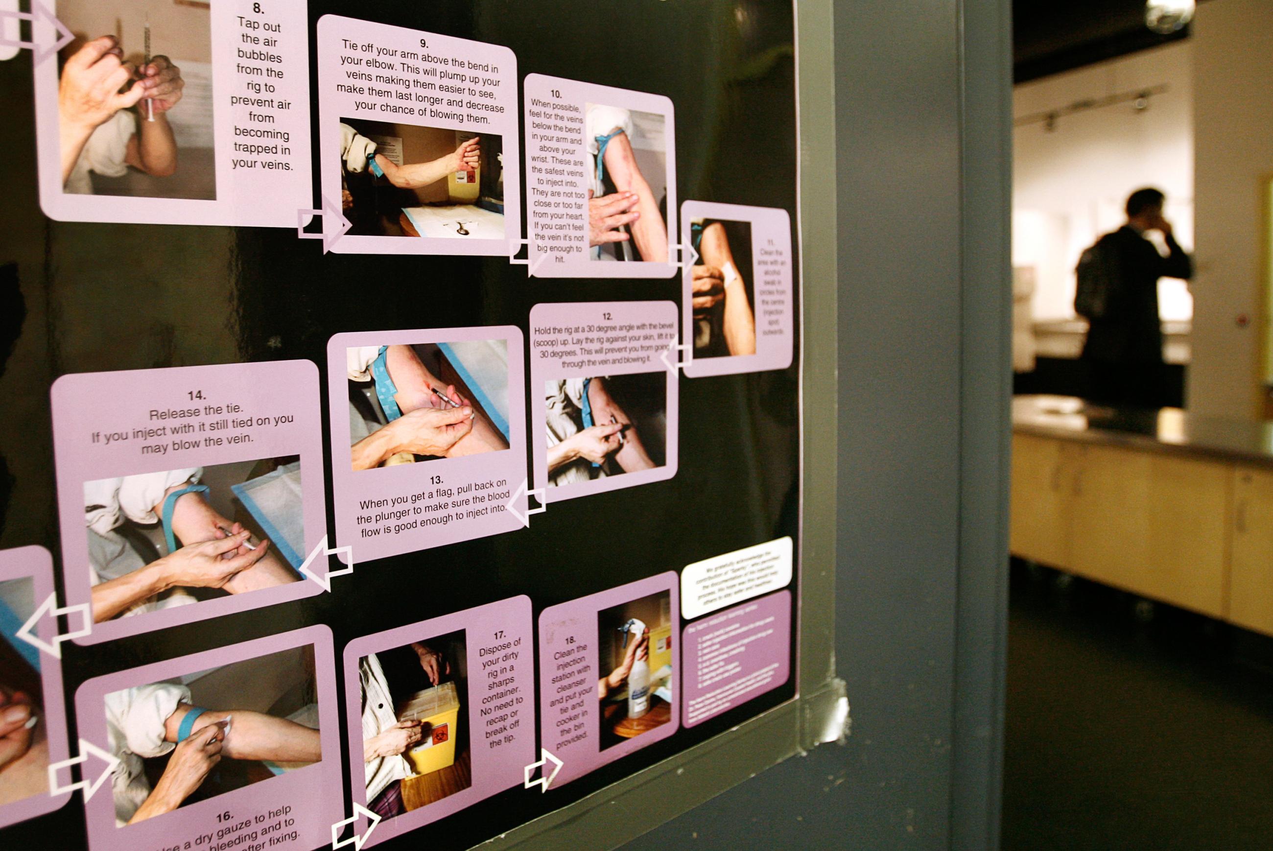 A poster shows how to use a syringe safely inside a safe injection site for drug addicts on Vancouver, British Columbia's eastside August 23, 2006.