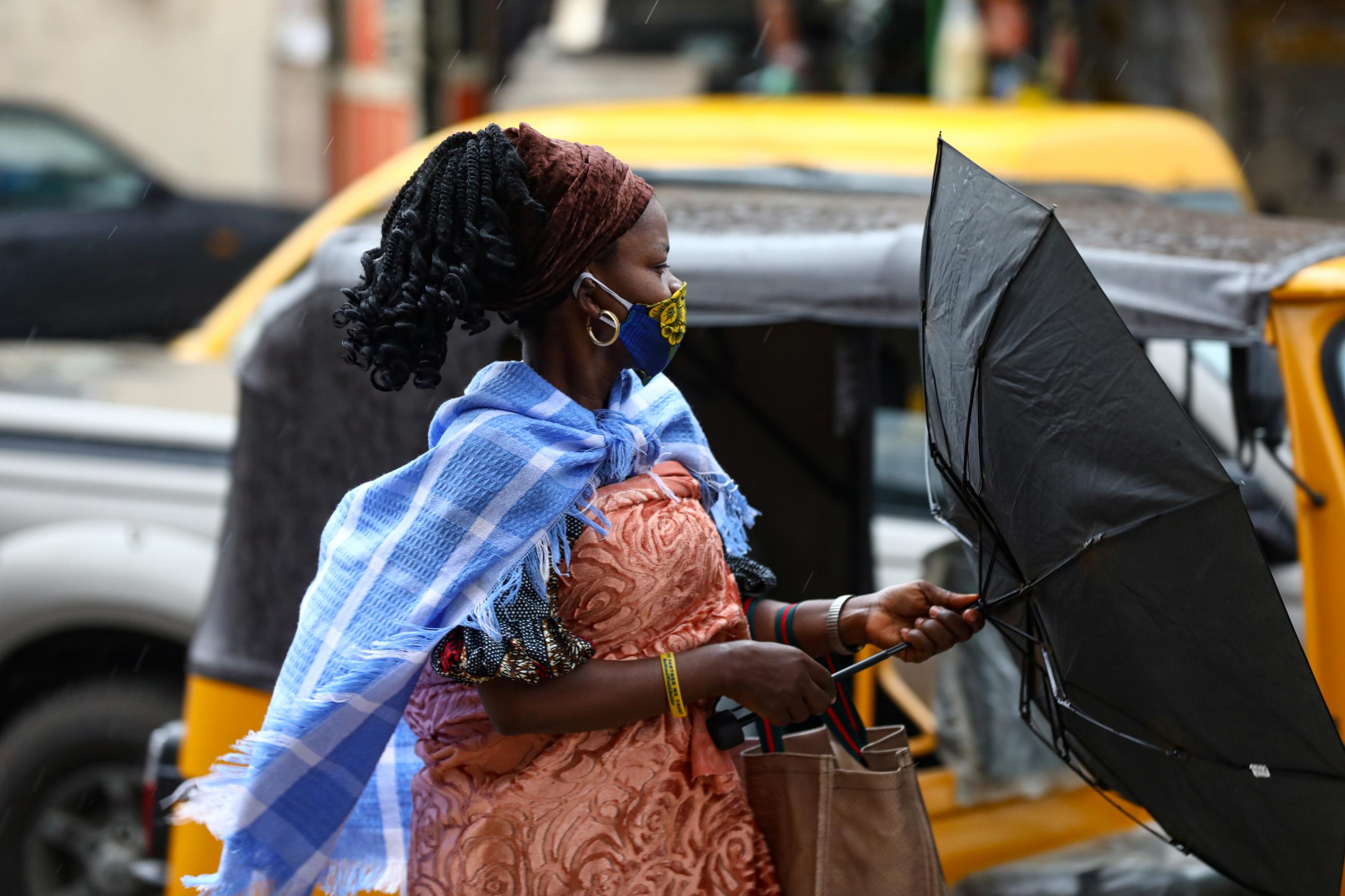 A woman wearing a mask in Lagos, Nigeria on May 4, 2020. Public health experts believe COVID mask requirements helped reduce monkeypox transmission during air travel.