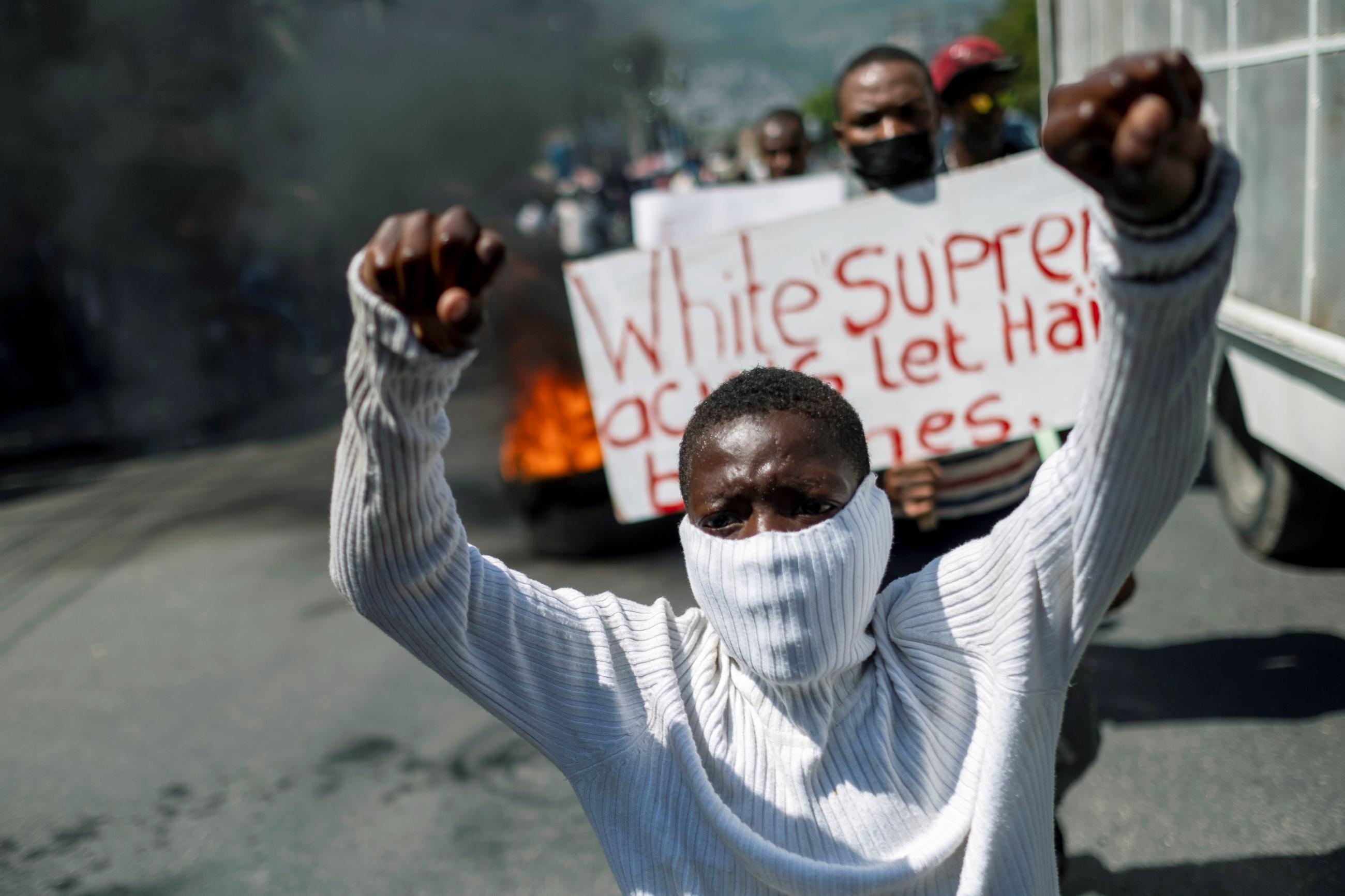DOCUMENT DATE: July 28, 2021 People protest against the U.S. on streets of Port-au-Prince, Haiti July 28, 2021.